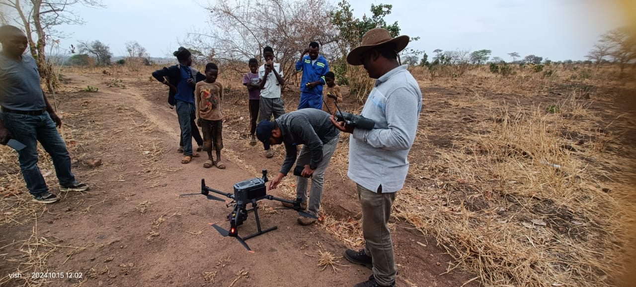 Crew preparing a survey drone for a LiDAR mission